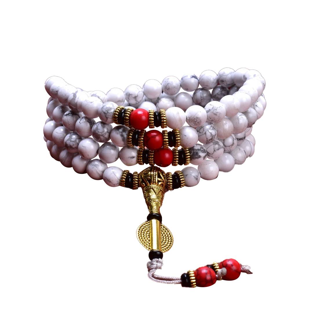 Japamala tibetano de 108 contas em howlita branca, detalhes em turquesa vermelha e amuleto dourado, promove calma e equilíbrio - Pelicano Azul
