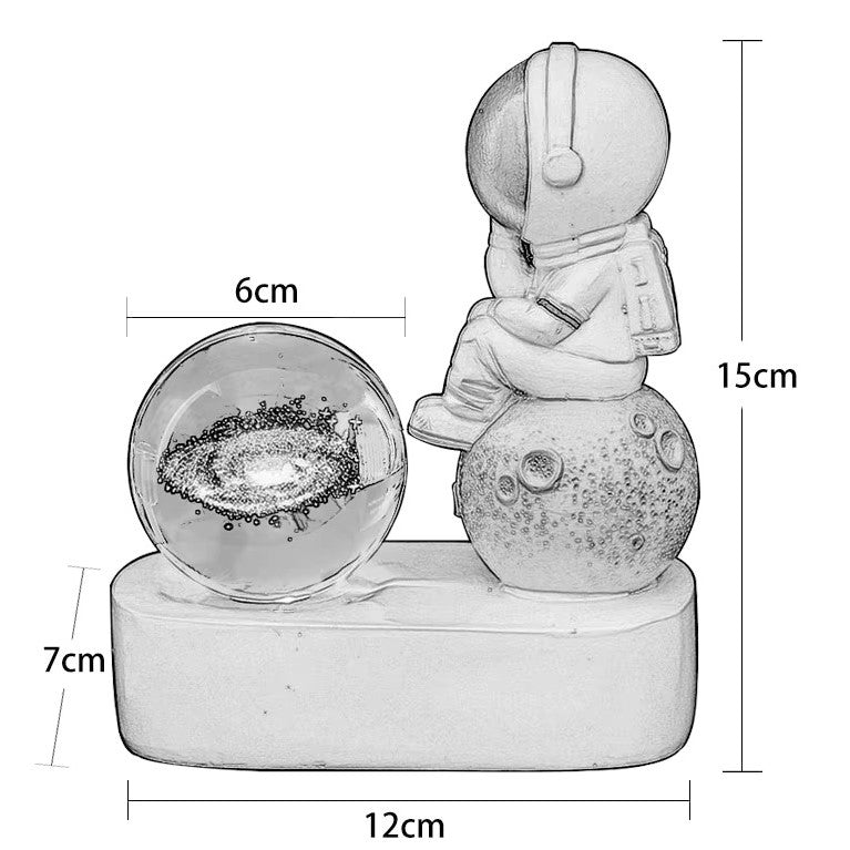 Esquema técnico da Luminária Planetária Astronauta com medidas e detalhes da bateria e do botão de ligar/desligar.