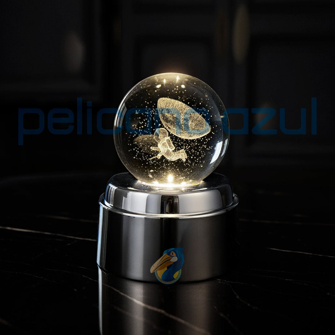 luminária giratória com astronauta e lua iluminada sobre base metálica brilhante