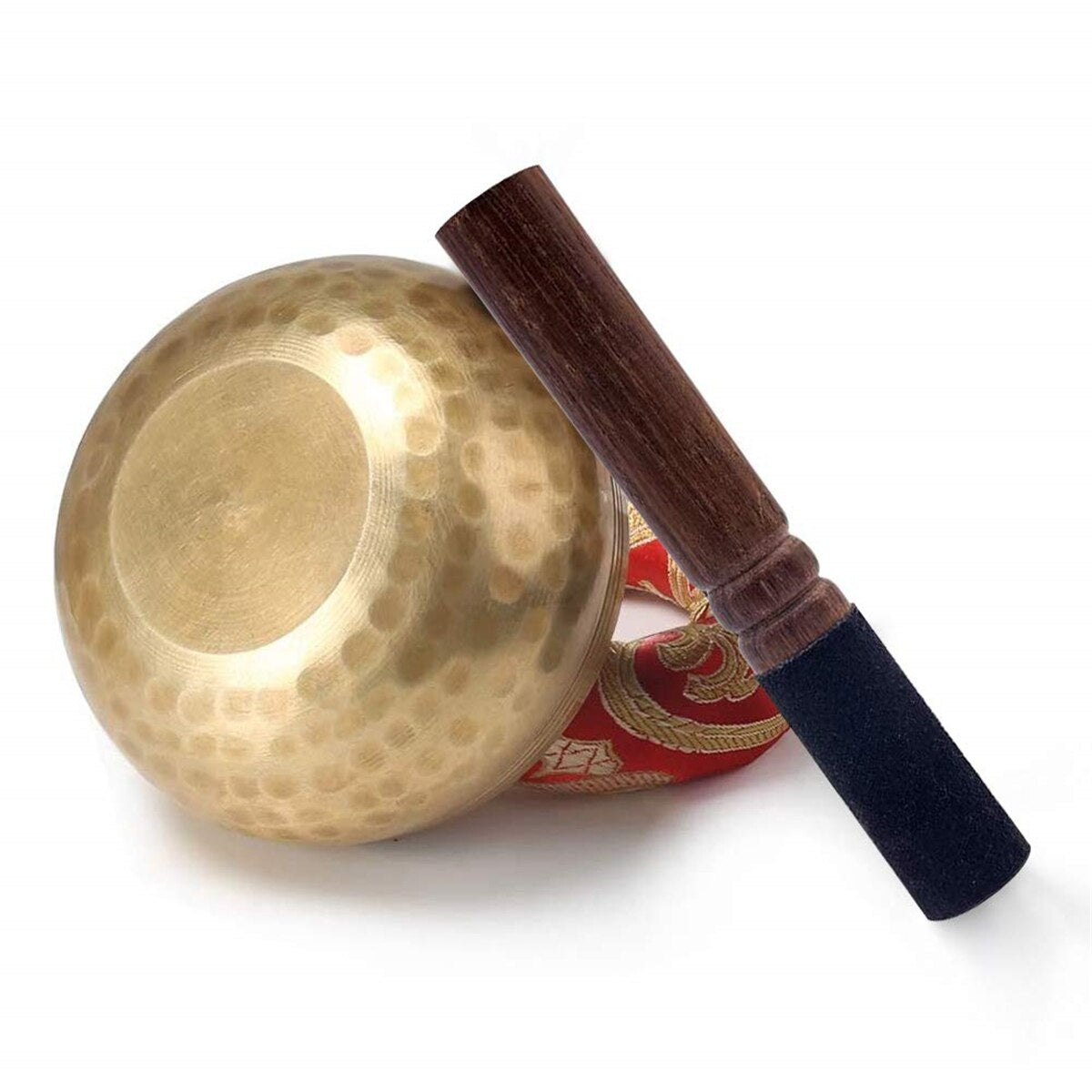 Vista superior da Tigela Tibetana com acabamento martelado e bastão de madeira. Ideal para práticas meditativas e relaxamento profundo. Inclui suporte decorativo em tecido vermelho.