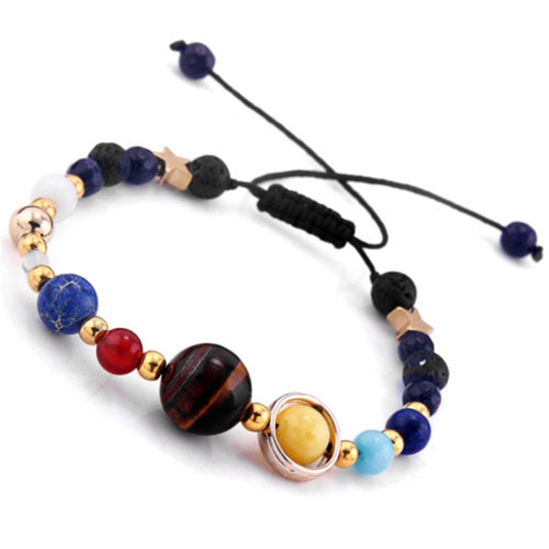 Pulseira do Sistema Solar com planetas e estrelas douradas, fecho ajustável, Pelicano Azul.