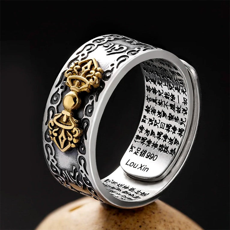  Anel Feng Shui em prata 990 com símbolos Vajra dourados e inscrições internas de mantras, Pelicano Azul.