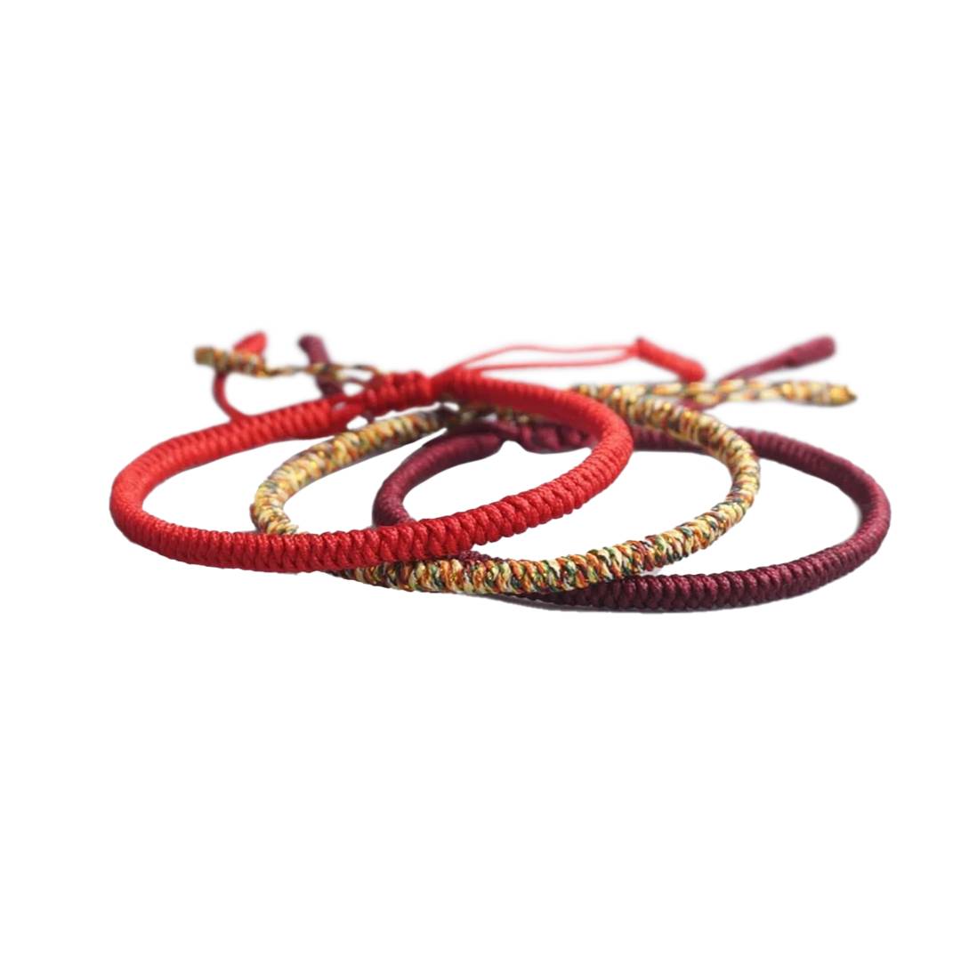 Conjunto de pulseiras budistas da prosperidade em cordão ajustável vermelho, roxo e multicolorido, Pelicano Azul.