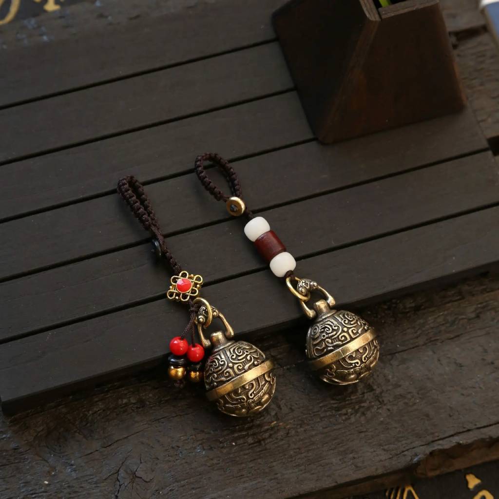 dois-chaveios-do-feng-shui-chaveiro-para-carro-modelo-bell-gourd-angulo Pelicano Azul