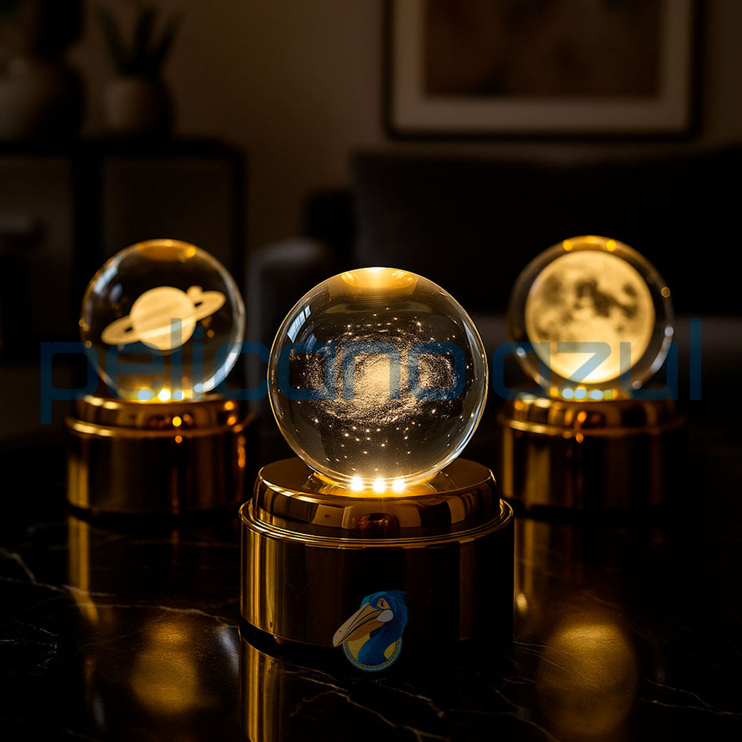 luminária giratória decorativa com galaxia iluminada em base dourada para sala moderna
